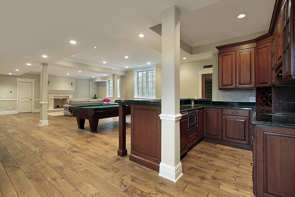 Basement with fireplace and bar